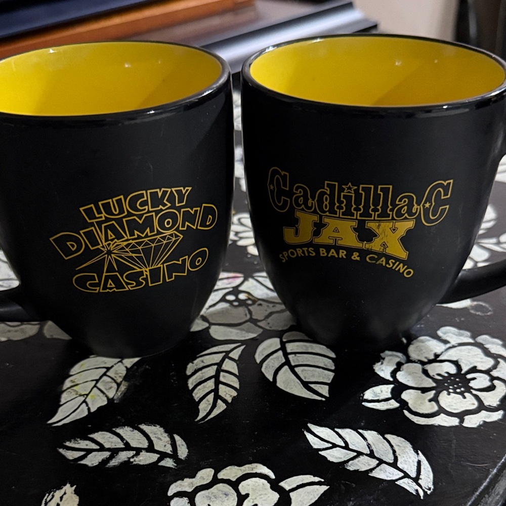Pair of Lucky Diamond and Cadillac Jax Black and Yellow Mug Set